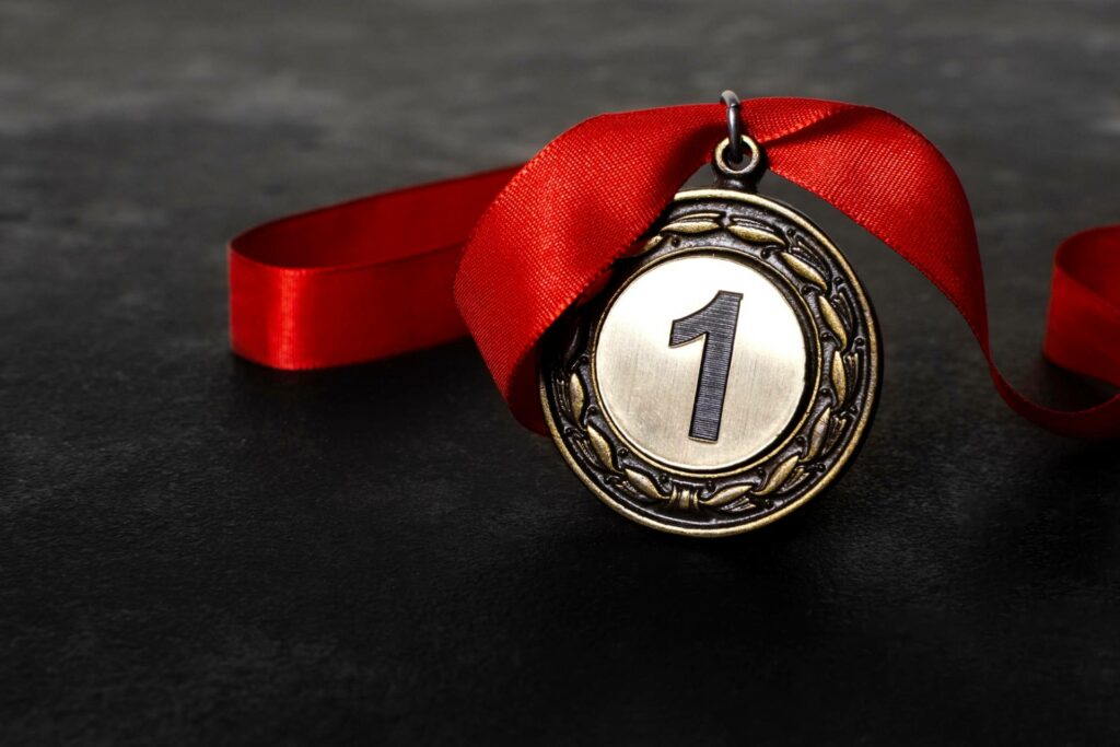 medal with red ribbon